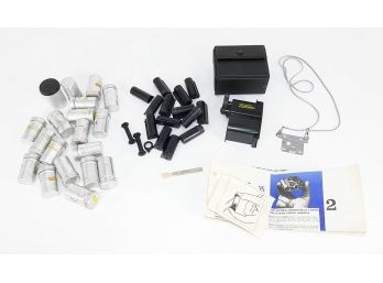 Vintage Tessina 35mm Camera Lot - Film Canisters, Cassettes, Tripod, Loader, Etc
