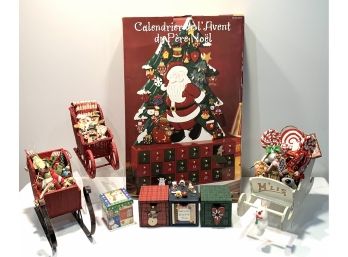 Advent Calendar And Sleighs Filled With Ornaments