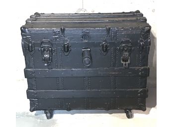 Antique Black Trunk On Casters