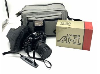 Canon A-1 Nikon 35mm Camera, Case And Camera Bag