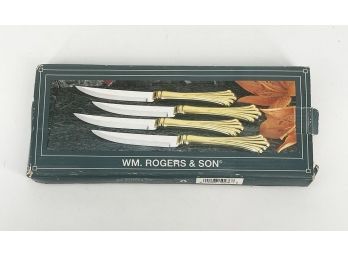 Set Of 4 W.M. Rogers Gold Plated Royal Plume Steak Knives - Never Used In Box