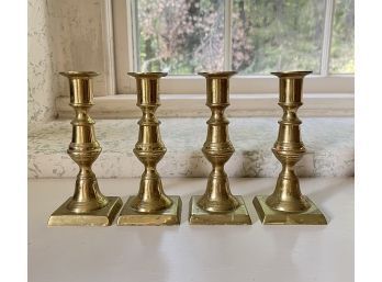 Set Of 4 Newport Brass Candlesticks