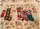 Lot Of 7 Vintage Christmas Stocking And A Rag Doll