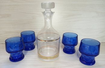 Blue Goblets And Glass And Gold Decorated Decanter