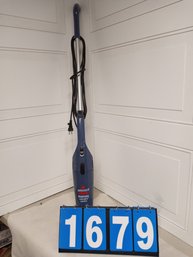 A Bissell Feather Weight Bagless Vacuum Cleaner
