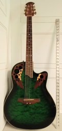An Ovation Celebrity OP30 6 String Electric Guitar