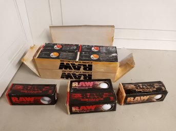 12 Unopened Boxes Of Slazenger Brand Golf Balls, 3 'Raw Distance Extreme' And 9 'Raw Distance'