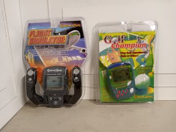 2 Vintage, Hand Held Video Games. Never Opened. Games Are 'Flight Simulator' And 'Golf Champion'.