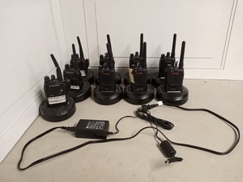 9 Walkie-talkies With Bases And Motorola Brand Power Supplies.
