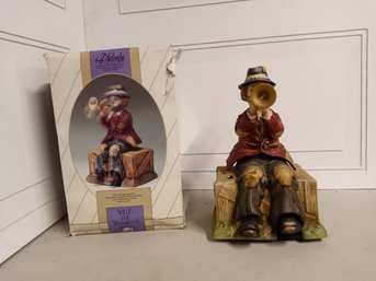 1 Melody In Motion Figurines,  Hand-painted Porcelain Bisque Finish, Willie The Trumpeter