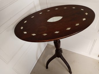 Oval Topped Side Table With Mirror Details.