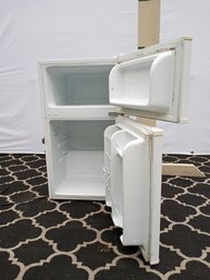 GE Brand Small Refrigerator, About 3' Tall   Height 22 Width 19 Depth 19.5