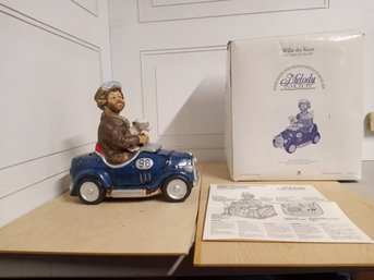 'Willie The Racer' Melody In Motion Figurine, Hand-painted Porcelain Bisque Finish