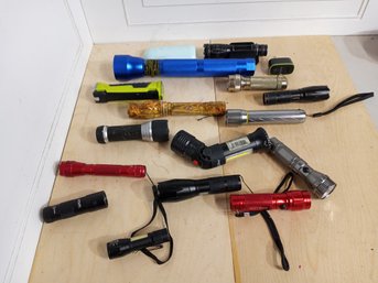 15 Flashlights And Some Extra Bits. See Pictures For What Is In The Lot