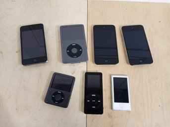7 IPods, Different Sizes, Years And Gig Capacity