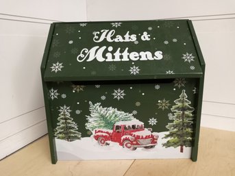 A Small, Wooden Bin Labeled 'Hats & Mittens'. Bin Is Roughly 7' Depth X 13' Tall X 12' Wide.