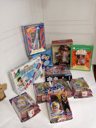 11 Unopened Toys. See Pics For Contents Of Lot.