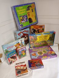 10 Board Games, Toys Or Puzzles For Younger Children. See Pictures For Contents Of Lot. Never Opened.