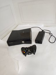 XBox 360 Console System, A Wireless Controller, Power Supply.  Boots Up When Plugged In See Second Photo.