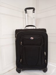 Black American Tourister Brand Travel Luggage With Wheels And Telescoping Pull