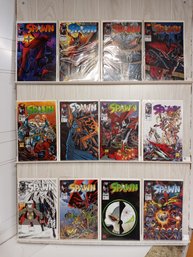 12 Spawn Comics. See Pictures For Titles And Issues. Comics Are Bagged And Boarded.
