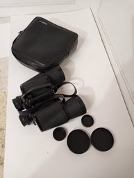 Tasco Brand Binoculars, Caps And Carrying Case.
