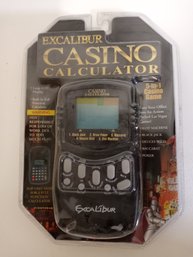 Excalibur Brand, Hand Held Casino Calculator Video Game. Several Games In One Unit. Never Opened.