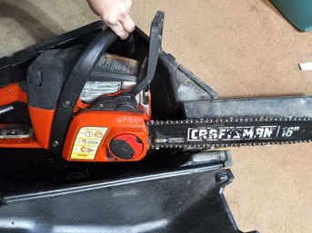 A Craftsman 16' / 36cc Chainsaw And Heavy Duty Plastic Case.
