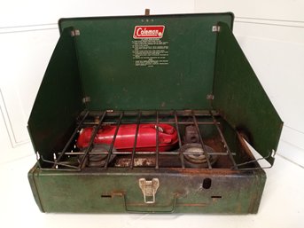 Coleman Brand, Gas Powered Outdoor Stove. Compact And Easy To Carry. Metal Outsides.