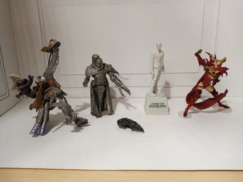 Various Figurines. Includes An Extra Shield.