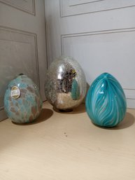 3 Glass Eggs.