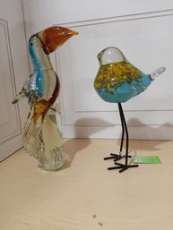 2 Glass Birds.