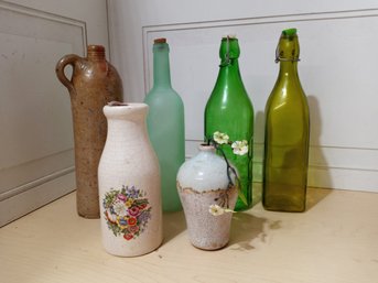 6 Tall Glass Vases Or Similar Items. See Pictures For Details