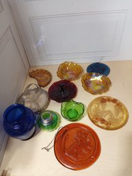 A Colorful Assortment Of Trivets, Sun Catchers, Shallow Dishes And More.
