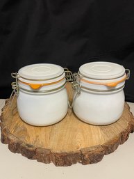 Pair Of Milk Glass Clamped Jars