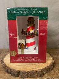 Santa And Reindeer Circle Around Lighthouse While Music Plays