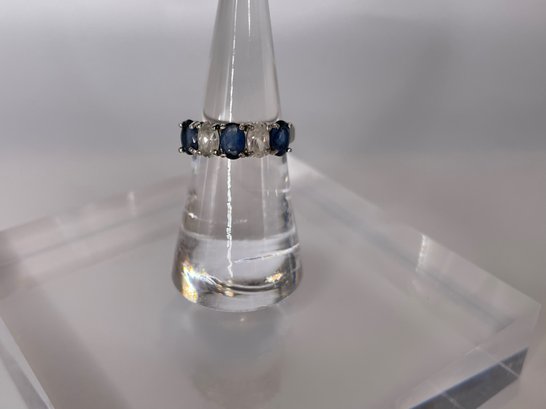 Sterling Silver Ring With Clear And Dark Blue Stones 2.97g