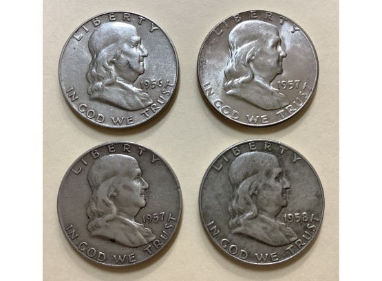Four Franklin Half Dollars 1956, 1957, 1957-D, 1958-D Silver U.S. Coins