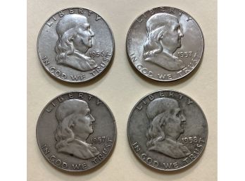 Four Franklin Half Dollars 1956, 1957, 1957-D, 1958-D Silver U.S. Coins