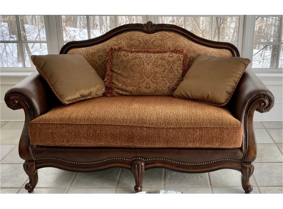 CARVED MAHOGANY DESIGNER LOVESEAT WITH LEATHER AND CHENILLE UPHOLSTERY MINT CONDITION