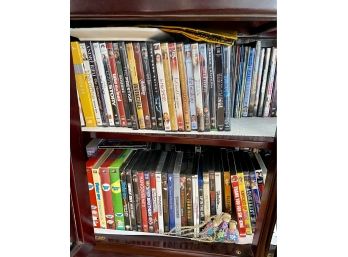 SHELVES OF DVDS, SOME SETS NOT OPENED ALMOST 200 IN TOTAL