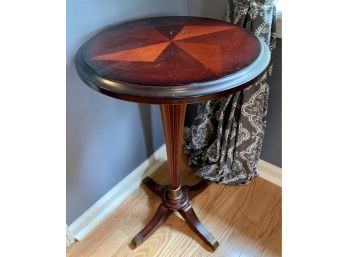 Round Pedestal Table With Starburst Pattern