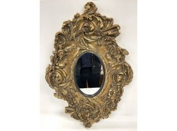 Ornately Carved Neoclassical Giltwood Oval Mirror