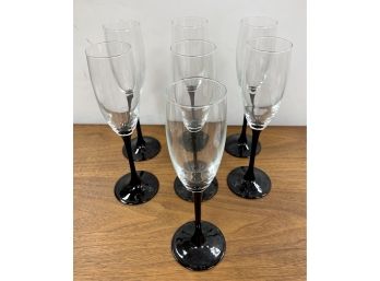 Set Of 7 Champagne Flutes With Black Stems