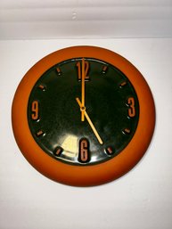 Terracotta-colored Clock