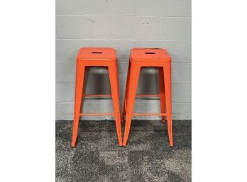 Two Industrial Stackable Metal Chairs