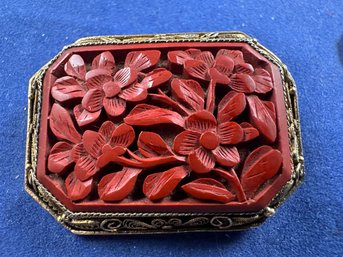 Carved Cinnabar And Silver Brooch