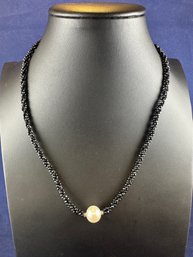 Single Strand Black Spinel And Large White Pearl In Center, 18-19.5'