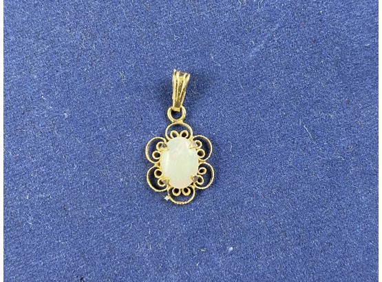 14k Yellow Gold And Opal Pendant With Filigree