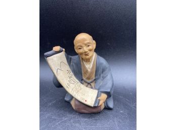 Old Japanese Mudman Figurine With Scroll